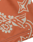 Close-Up of RF-Wear Women's Paisley Shorts - Apricot/Cream with RF logo