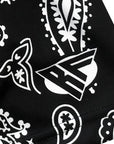 Close-up of Women's black/white paisley print shorts with brand logo