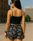 Woman wearing RF-Wear Women's Paisley Shorts - Black/White - Back View