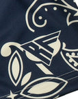 Close-up of RF-Wear Navy/Cream Paisley Shorts with brand logo