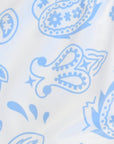 Close-up women's white/baby-blue paisley shorts.