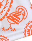 Close-up of RF-Wear Women's Paisley Shorts - White/Orange with RF logo