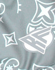 Close-up of RF-Wear Women's Split Paisley Shorts in Green/Silver with RF logo