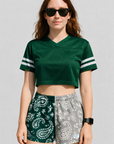 woman wearing a green top and RF-Wear Women's Split Paisley Shorts in Green/Silver