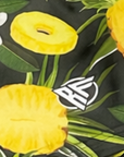 Close-up of RF-Wear Women's Pineapple Paradise shorts with RF logo