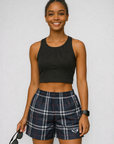 Woman wearing a black top and RF-Wear Women's Tartan Plaid Shorts in Navy/White
