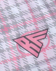 Close-up of RF-Wear Women's Tartan Plaid Shorts in Pink/White with RF logo