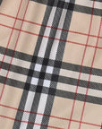 Close-up of RF-Wear Women's Tartan Plaid Shorts in Tan/Black