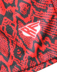 Close-Up of Women's Snakeskin Shorts in Red with RF logo
