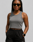 Woman wearing a grey top and RF-Wear Women's Solid Color Shorts in Black