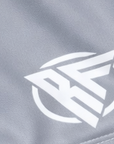 Close-up of RF-Wear Women's Solid Color Shorts in Grey with RF logo