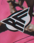 Close-up of RF-Wear Women's Tree Camo Shorts in Pink with RF logo