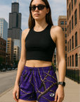 Woman wearing RF-wear Women's Tree Camo Shorts - Purple - Front View