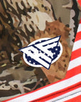Close-up of USA women's tree camo shorts with brand logo