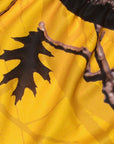 Close-up of women's tree camo shorts in yellow