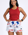Woman wearing a red top and RF-Wear Women's Patriotic Grunge Shorts in Red/White/Blue