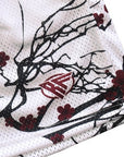 Close-up of RF-Wear Men's Mesh Blossom Shorts in White/Burgundy with RF logo