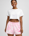 Woman wearing a white top and RF-Wear Women's Tie Dye Shorts in Pink