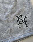 Close-up of RF-Wear Men's Mesh Butterfly Shorts in Grey with RF logo