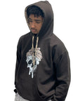 Man wearing RF-Wear Beanie Skull Hoodie in Brown from a front view.