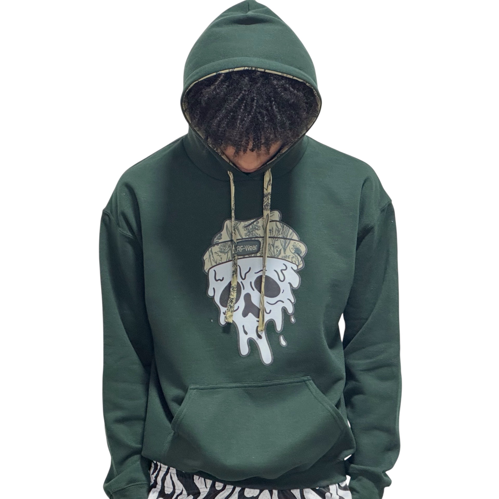 Person wearing a forest green RF-Wear beanie skull hoodie hoodie  on a white background