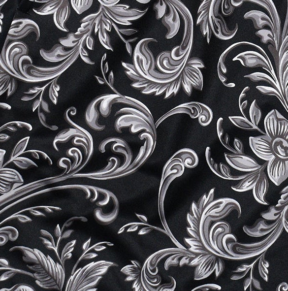 Silver floral pattern on a black background