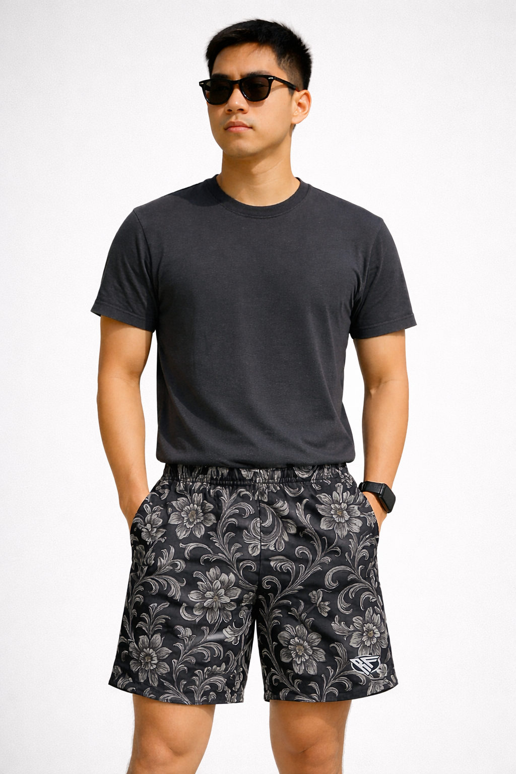 Man wearing a black t-shirt and RF-Wear Men's Baroque Shorts in Black