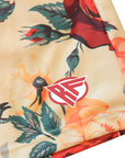 Close-up of RF-Wear Men's Floral Shorts in Cream/Red/Peach with RF logo