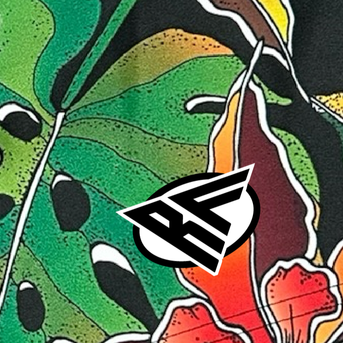 Close-up of RF-Wear Men's Floral Tropical Vibe Shorts with RF logo