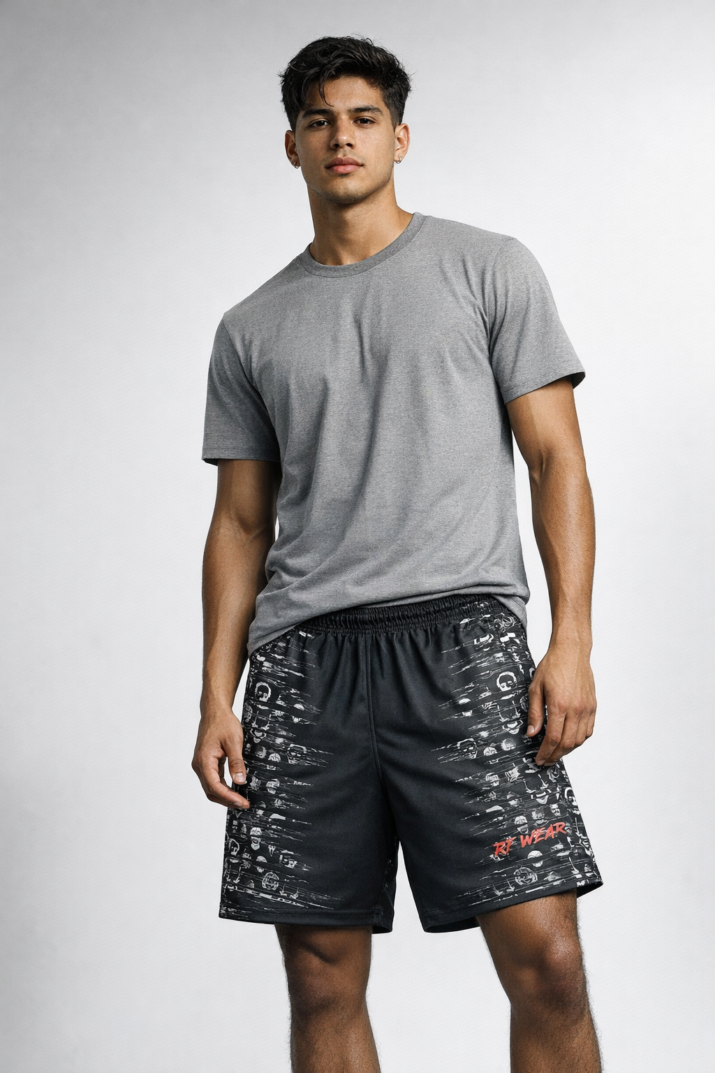 Man wearing a grey t-shirt and RF-Wear Men's Horror 2.0 Shorts in Black