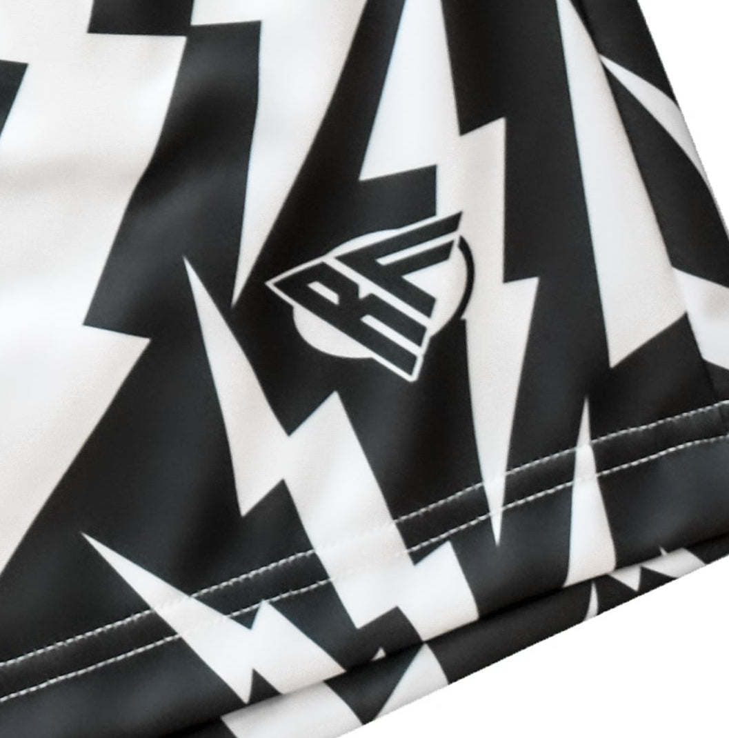 Close-up of RF-Wear Men's Lightning Bolt Shorts in Black/White with RF logo