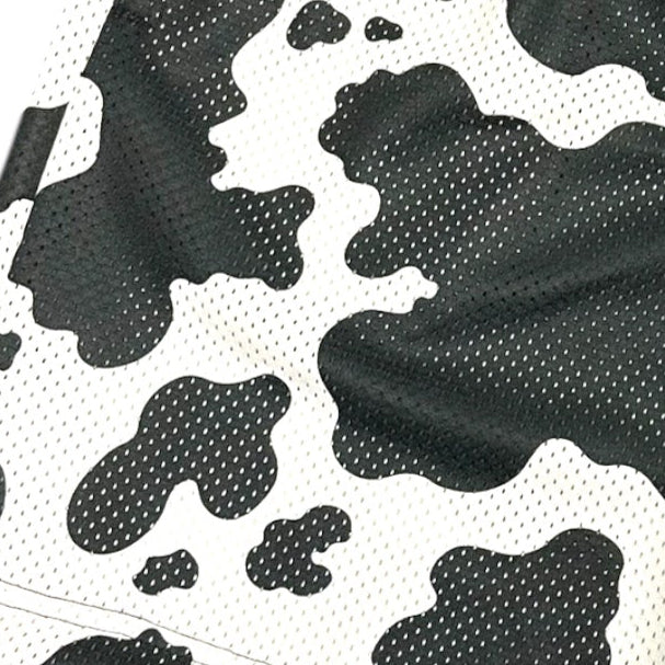 Close up of RF-Wear Men's Mesh Animal Print Shorts  - Cow - Black/White 