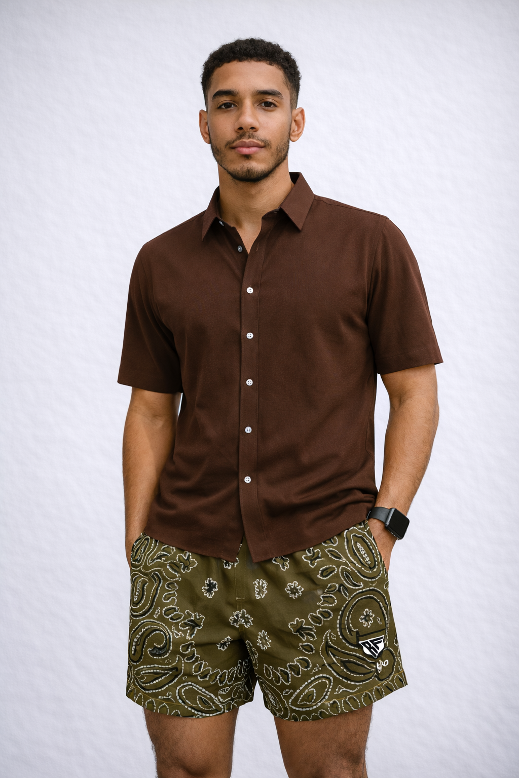 Man wearing a brown shirt and RF-Wear Men's Mesh Bandana Shorts in Brown