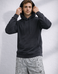 Man wearing a black hoodie and RF-Wear Men's Mesh Bandana Shorts in Grey