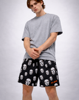 Man wearing a grey t-shirt and RF-Wear Men's Mesh Boogeyman Faces Shorts in Black/White