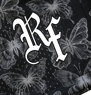 Close-up of RF-Wear Men's Mesh Butterfly Shorts in Black with RF logo