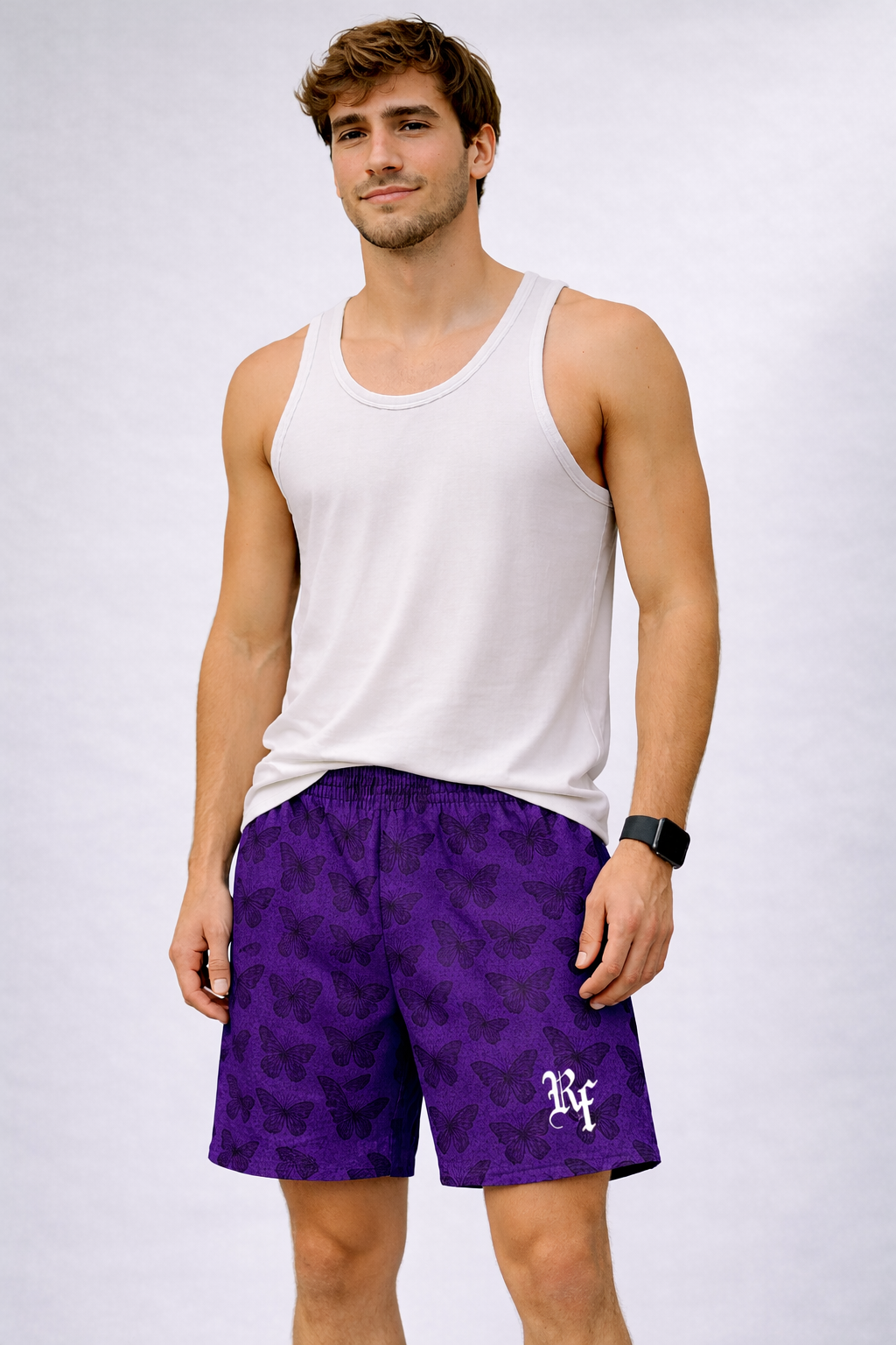 Man wearing a white tank top and RF-Wear Men's Mesh Butterfly Shorts in Purple 