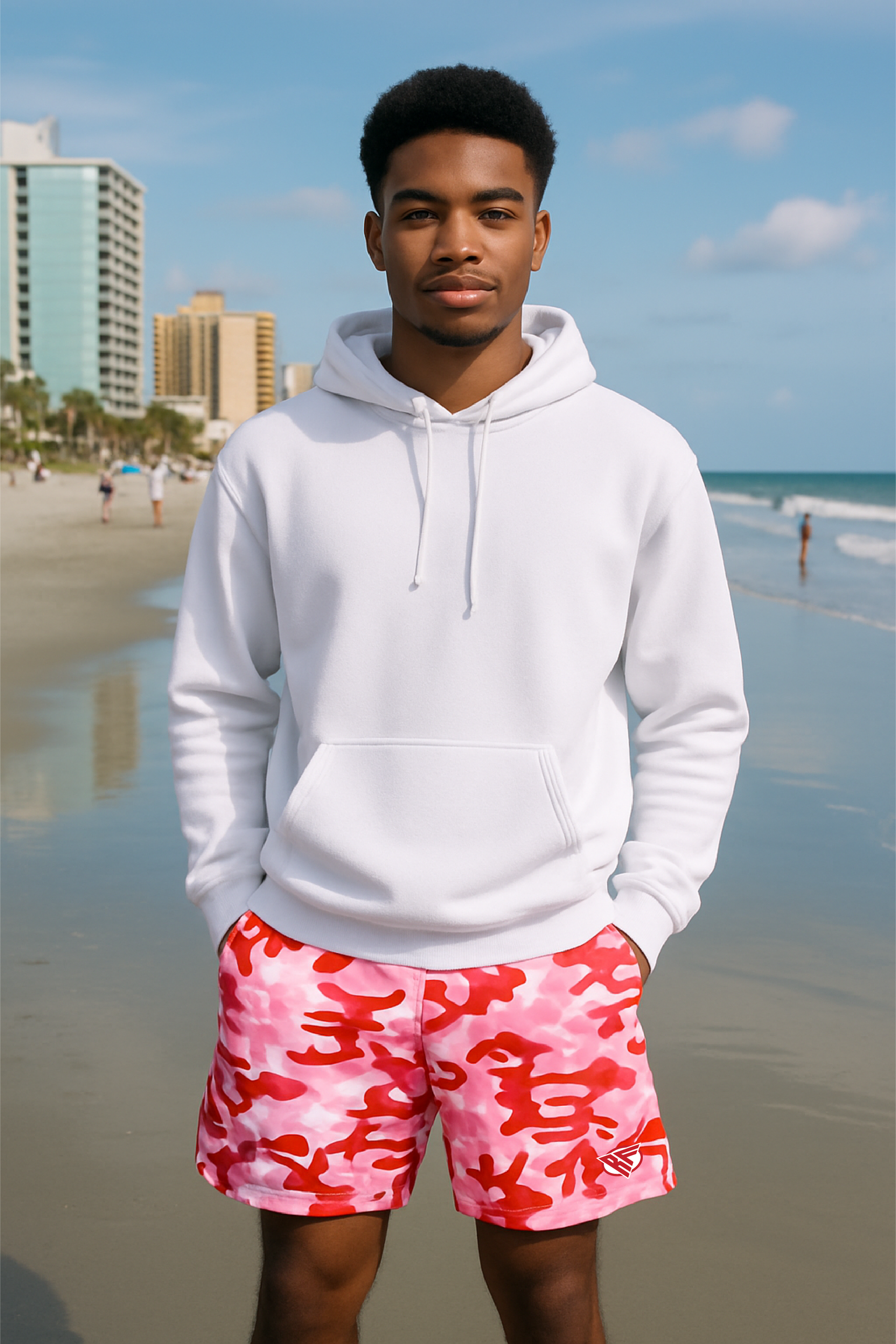 Man wearing RF-Wear Men's Mesh Camo Shorts in Pink/Red and white hoodie