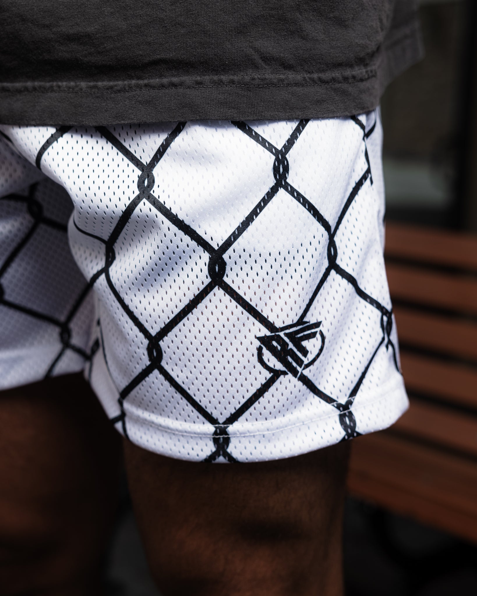 Close-up of RF-Wear Men's Mesh Chain Link Shorts - White/Blacke