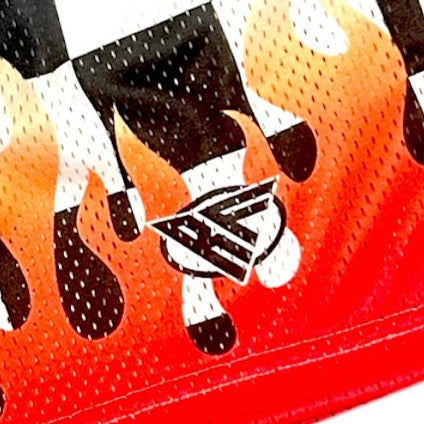 Close-up of RF-Wear Men's Mesh Checkered Flame Shorts in Black/White Red Flame with RF logo