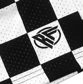 Close-up of RF-Wear Men's Mesh Checkered Shorts in Black/White with RF logo