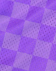 Close-up of RF-Wear Men's Mesh Checkered Shorts in Purple
