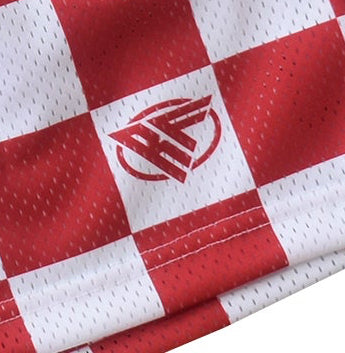 Close up of RF-Wear mesh checkered shorts in red and white with logo
