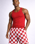 Man wearing a red tank top and RF-Wear Men's Mesh Checkered Shorts in Red/White 