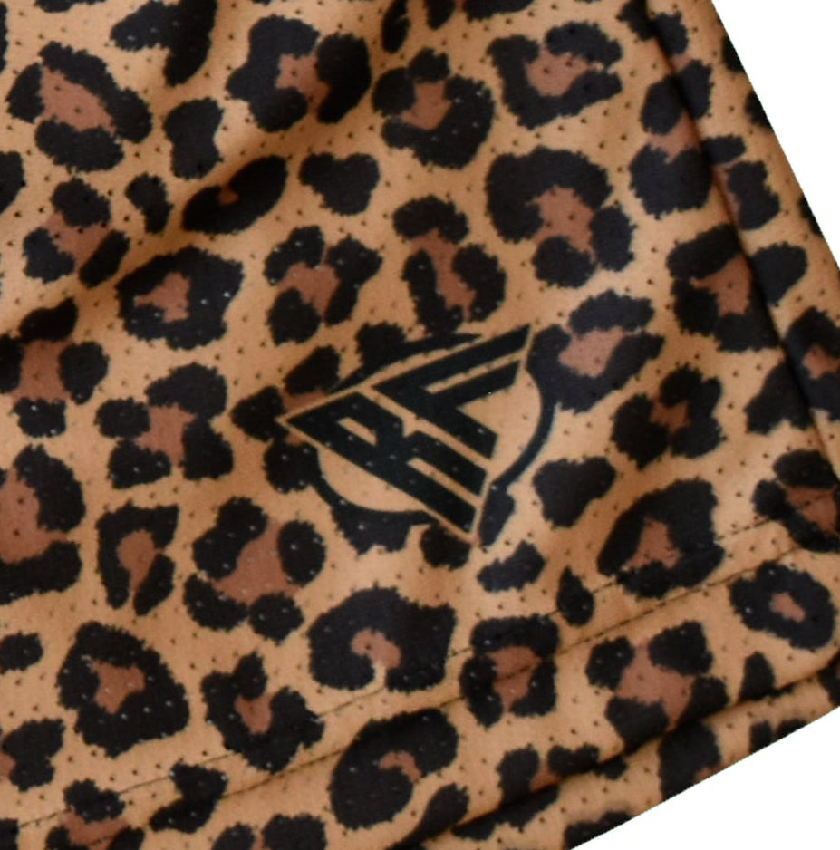 Close-up of RF-Wear Men's Mesh Animal Print Shorts - Cheetah in Brown with RF logo