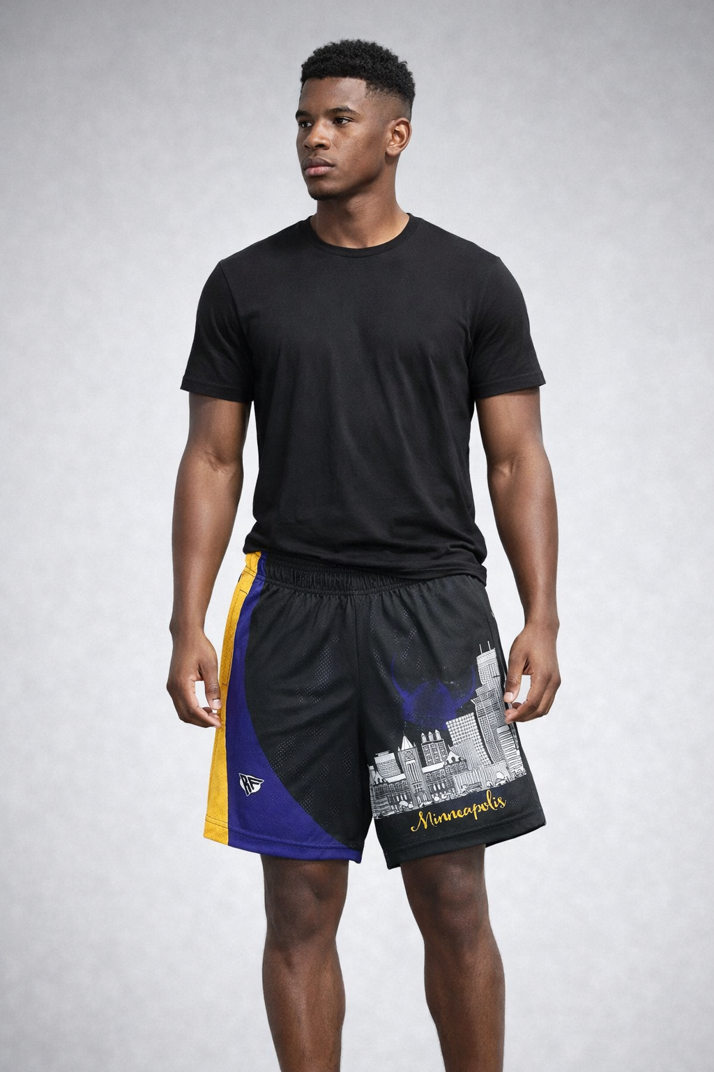 Man wearing black t-shirt and RF-Wear Men's Mesh Minneapolis Cityscape Shorts in  Black/Purple