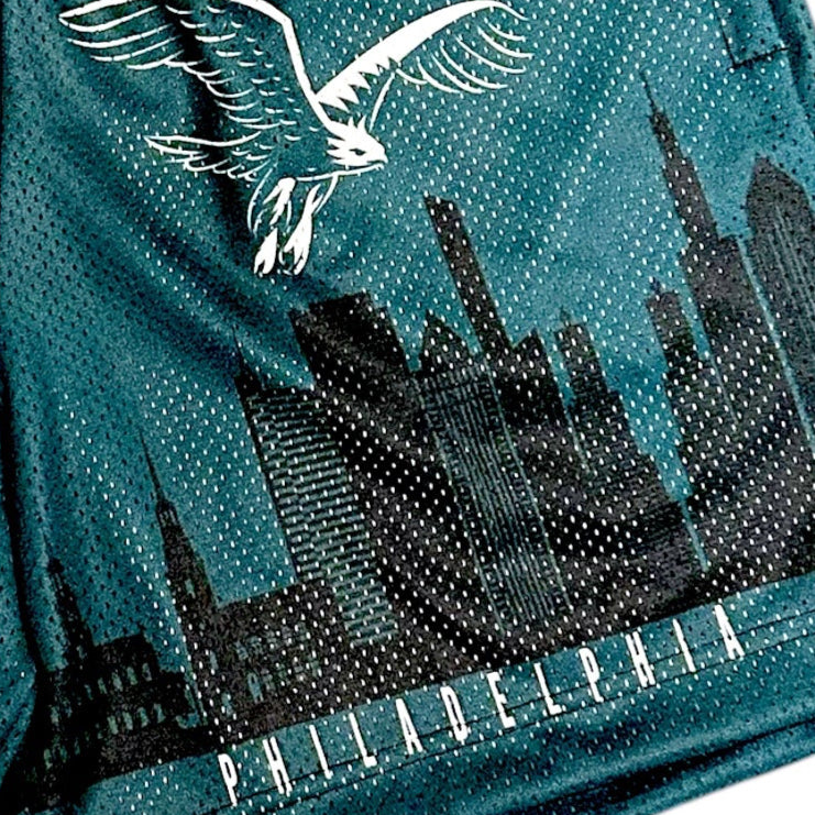Close up of RF-Wear Men's Mesh Philadelphia Cityscape Shorts in Green/Black