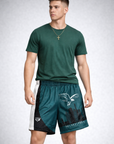 Man wearing a green t-shirt and RF-Wear Men's Mesh Philadelphia Cityscape Shorts in Green/Black