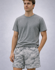Man wearing a grey t-shirt and RF-Wear Men's Mesh Cloud Shorts in Grey 