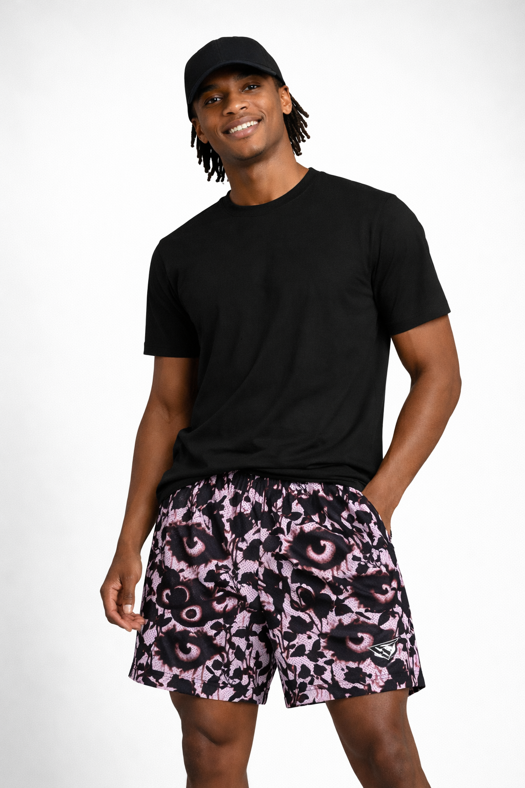 Woman wearing a black t-shirt and cap, and RF-Wear Men's Mesh Creepy Garden Shorts in Twilight/Black